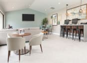 Thumbnail 18 of 36 - Community area with seating and computers at Mission Trails Apartments San Diego, San Diego, California
