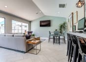 Thumbnail 34 of 36 - Community area with seating and computers at Mission Trails Apartments San Diego, San Diego, 92119