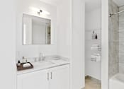 Thumbnail 46 of 50 - White interior bath at 65 Bay Street, Jersey City, New Jersey