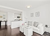 Thumbnail 26 of 50 - Living room with white couch at 65 Bay Street, Jersey City, NJ, 07302