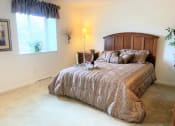 Thumbnail 9 of 17 - King Size Bedroom at Dannybrook Apartments, Williamsville, NY, 14221