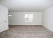 Thumbnail 20 of 22 - Large Bright Living Room at Stone Hedge Village Townhouses, Farmington, NY