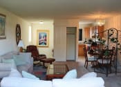 Thumbnail 4 of 22 - Bright Dining and Living Room at Stone Hedge Village Townhouses, Farmington, NY