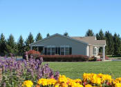Thumbnail 1 of 22 - Beautiful Flowers and Green Lawn at Stone Hedge Village Townhouses, Farmington, NY