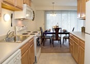 Thumbnail 9 of 20 - Stylish Kitchen at Winton Village Apartments, New York