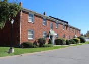 Thumbnail 11 of 11 - Exterior Brick Building at Georgetown Apartments, Williamsville, NY