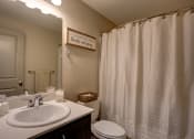 Thumbnail 21 of 50 - Bathroom with toilet at Commons at Redwood Creek Apartments, Beaverton