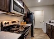 Thumbnail 17 of 50 - Kitchen gallery at Commons at Redwood Creek Apartments, Beaverton, OR