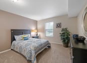 Thumbnail 10 of 27 - Bedroom with window and overhead light at burwick farms