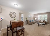 Thumbnail 6 of 27 - connected living and dining area at burwick farms apartments