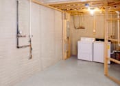 Thumbnail 18 of 22 - Basement with washer and dryer included at Carlson Woods Townhomes, Baltimore, MD