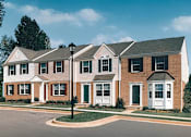 Thumbnail 1 of 22 - Front Exterior at Carlson Woods Townhomes, Baltimore, MD, 21244