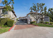 Thumbnail 2 of 8 - Entrance into the community which is gated.