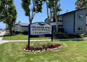 Thumbnail 1 of 10 - Property Sign in Front of Property  that says Delaware Pines Apartments