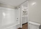Thumbnail 10 of 15 - Bathroom with Tub