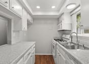 Thumbnail 7 of 15 - Upgraded Kitchen with White Cabinets