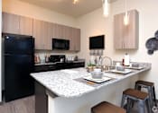 Thumbnail 2 of 11 - Gourmet Kitchen at The Liberty Lofts, Texas