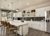 Thumbnail 6 of 18 - Community Room with Serving Kitchen at VINTAGE AT THE CROSSING, Reno, NV 