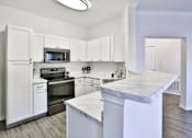 Thumbnail 24 of 60 - Island Kitchen at The Vineyards of Colorado Springs, Colorado Springs