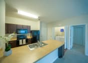 Thumbnail 23 of 28 - Abigail Court Apartments Kitchen