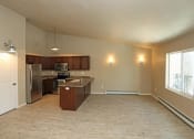 Thumbnail 5 of 12 - Open Concept Kitchen, Dining and Living Area