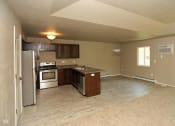 Thumbnail 6 of 12 - Open Concept Kitchen, Dining and Living Area