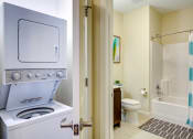 Thumbnail 18 of 28 - Model apartment with in home washer and dryer, large bathrooms