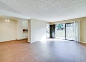 Thumbnail 26 of 63 - Carpeted Lounge Area at Highlander Park Apts, Riverside, California