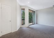 Thumbnail 10 of 18 - Living Room With Balcony View at Hollywood Vista, California, 90046