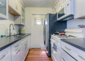 Thumbnail 20 of 59 - Massive I-Shaped Kitchen at La Vista Terrace, California, 90046