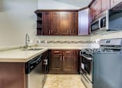 Thumbnail 8 of 59 - Spacious Kitchen with Pantry Cabinet at La Vista Terrace, Hollywood, California