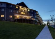 Thumbnail 38 of 80 - Night Exterior View of Bluffs of Williston Apartments ND