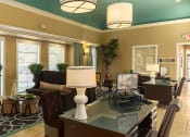 Thumbnail 18 of 55 - a living room filled with furniture and a large window
