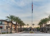 Thumbnail 53 of 55 - a flag pole with an american flag at the end of a street