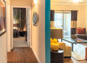 Thumbnail 36 of 55 - a living room with a blue accent wall