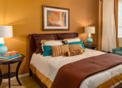 Thumbnail 50 of 55 - a bedroom with a bed and a chair in a 555 waverly unit