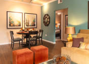Thumbnail 29 of 55 - a living room with blue walls and orange furniture