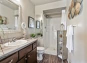 Thumbnail 18 of 41 - Bathroom with Walk-In Shower and Plenty of Light