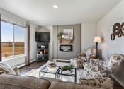 Thumbnail 14 of 41 - Living Room with Fireplace and Large Window