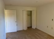 Thumbnail 4 of 17 - A beautifully-appointed bedroom with a carpeted floor.