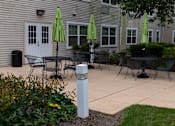 Thumbnail 2 of 9 - Exterior view of Park View at Randallstown, a senior apartment community near downtown Randallstown, MD, offering affordable one-bedroom homes with secure building access.