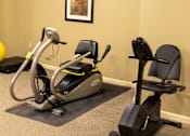 Thumbnail 6 of 9 - Modern on-site fitness center at Park View at Randallstown featuring exercise equipment designed to support active, healthy lifestyles for senior residents.