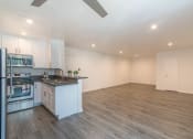 Thumbnail 10 of 19 - Dining area and kitchen