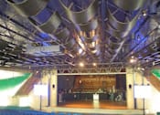 Thumbnail 38 of 40 - Theater room with stage and exposed ductwork at The Brook At Columbia Apartments, Columbia, 21044