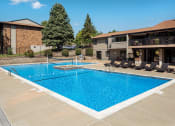 Thumbnail 23 of 32 - Swimming Pool With Relaxing Sundecks at Whisper Hollow Apartments, Maryland Heights, MO, 63043
