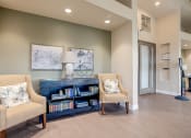 Thumbnail 7 of 15 - Seating area by bookcase at VINTAGE AT BENNETT VALLEY, Santa Rosa, CA 