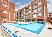 Thumbnail 8 of 26 - Pool With Sunning Deck at Greenway at Fisher Park, Greensboro, NC, 27401