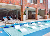 Thumbnail 9 of 26 - Swimming Pool With Relaxing Sundecks at Greenway at Fisher Park, Greensboro, NC