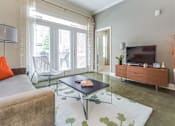 Thumbnail 21 of 26 - Classic Living Room Design With Television at Greenway at Fisher Park, Greensboro, NC
