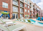 Thumbnail 20 of 35 - Mini Swimming Pool And Relaxing Area at Greenway at Stadium Park, Greensboro, North Carolina